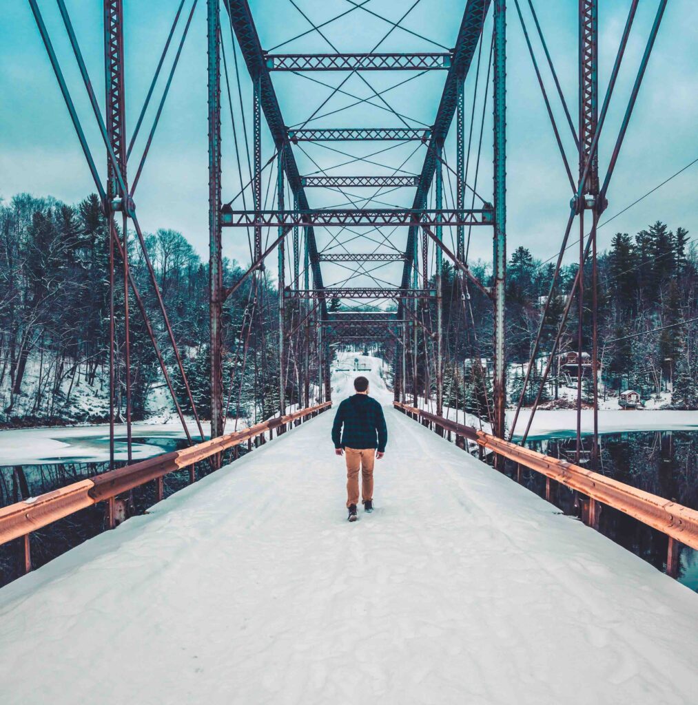 bridge with a person walking across